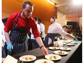 Stephen La Salle of the Albion Rooms prepared Duck skin crusted monkfish, Saffron cauliflower puree,  Macadamia Romesco during the 2014 Gold Medal Plate awards held at Shaw Centre in Ottawa, November 17, 2014. (Jean Levac/ Ottawa Citizen)