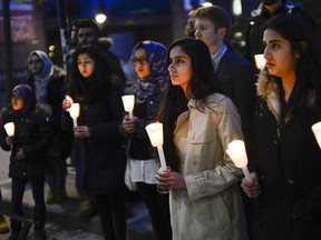 Students attend the candle light vigil held at Carleton University on Tuesday, March 29, 2016. Pakistani Students' Association Carleton held a candle light vigil in tribute to the victims of the attack in Lahore and other recent terror attacks around the world.