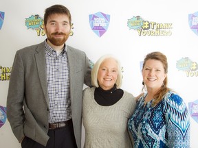 Superhero Week kicked off Saturday, March 5, 2016 at Regina Street Public School. The Barbara McInnes Superhero Award and the Barbara McInnes Jr. Superhero Award were presented at the launch. Barbara McInnes poses with award recipients Jackie Miller, right, and Christian Robillard.