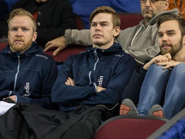 Swedish curlers taking in the action Niklas Edin, (from left) Christoffer Sundgren and Oskar Eriksson as the Tim Horton's Brier continues on Sunday at TD Place in Ottawa.