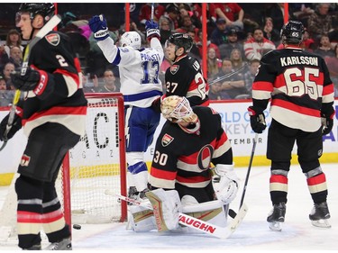 Tampa players celebrate the first goal in the second period as the Ottawa Senators take on the Tampa Bay Lightning in NHL action at the Canadian Tire Centre in Ottawa.
