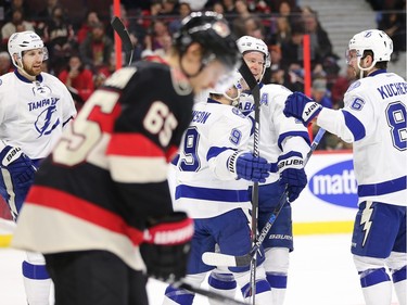 Tampa players celebrate the second goal in the second period as the Ottawa Senators take on the Tampa Bay Lightning in NHL action at the Canadian Tire Centre in Ottawa.