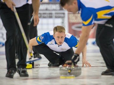 Team Alberta player Marc Kennedy watches his shot while playing PEI as the Tim Horton's Brier continues on Sunday at TD Place in Ottawa.