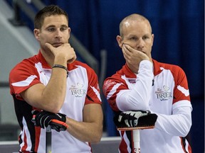 Team Canada skip Pat Simmons (R) and third John Morris during their game against Team Alberta  at the 2016 Brier in Ottawa on Thursday March 10, 2016.