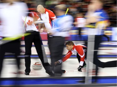 Team Canada Third John Morris throws a stone against Team Quebec at the Tim Hortons Brier at TD Place in Ottawa, March 05, 2016.