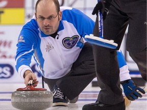 Team Quebec skip Jean-Michel Ménard delivers a rock during round robin play at the Brier in Ottawa on Friday March 11, 2016.
