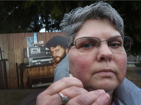 Carol-ann Lamarche holds a photo of her brother Ronald Marion outside her mother's home in Cornwall Thursday March 31, 2016.
