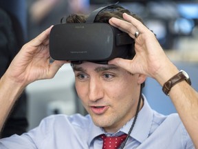 Prime Minister Justin Trudeau, pictured here during a recent visit to the headquarters of Montreal video game maker Ubisoft, is set to host premiers, and territorial leaders later this week. THE CANADIAN PRESS/Ryan Remiorz