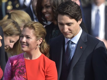 Canada's Prime Minister Justin Trudeau and his wife Sophie Grégoire-Trudeau take part in a welcome ceremony during a State Visit on the South Lawn of the White House on March 10, 2016 in Washington, DC.