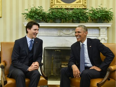 US President Barack Obama and Canadian Prime Minister Justin Trudeau meet in the Oval office at the White House in Washington, DC, on March 10, 2016. /