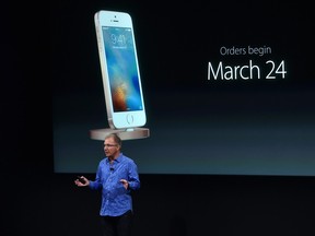 Apple Vice President of Product Marketing Gregory Joswiak introduces the new iPhone SE during a media event at Apple headquarters in Cupertino, California on March 21, 2016.  Today, Apple announced the release of a new smaller iPhone 6E, a 9.7 inch iPad Pro, and various software improvements for existing devices.  /
