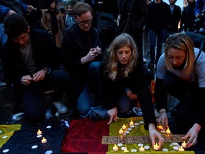 Mourners light candles in Trafalgar Square during a candlelit vigil in support of the victims of the recent terror attacks in Brussels on March 24, 2016 in London, England. Belgium is observing three days of national mourning after 34 people were killed in a twin suicide blast at Zaventem Airport and a further bomb attack at Maelbeek Metro Station. Two brothers are thought to have carried out the airport attack and an international manhunt is underway for a third suspect. The attacks come just days after a key suspect in the Paris attacks, Salah Abdeslam, was captured in Brussels.