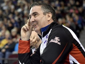 Ontario coach Wayne Middaugh looks on during a draw against Alberta at the Tim Hortons Brier in Ottawa on Saturday, March 5, 2016.
