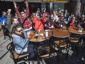 Ottawa Senators fans celebrate on the patio at The Lieutenant's Pump on Elgin Street in this file picture. The more patios, the better.
