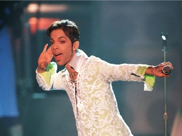 n this April 10, 1997 file photo, Prince performs a medley of "Take Me With U" and "Rasberry Beret" at the 4th annual VH1 Honors in Universal City, Calif. Prince's publicist has confirmed that Prince died at his home in Minnesota, Thursday, April 21, 2016. He was 57.