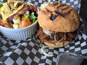 Brisket burger plus truck salad at Urban Cowboy, pix by Peter Hum