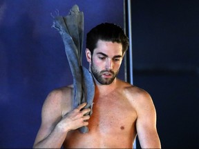 Canadian diver Maxim Bouchard dries off at the Canada Cup Grand Prix at the Centre Sportif de Gatineau on Saturday, April 9, 2016.