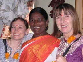Chandbi, middle, stands with Krisna Zawaduk, left, and Deborah Lomond, yoga teachers and Jagruti Seva Sanstha supporters. Chandbi was married at 12 years of age without ever having learned to read or write.