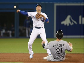 Ryan Goins of the Blue Jays gets a force out at second base of Todd Frazier of the White Sox in a game on April 27, 2016.