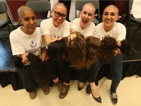 Students Tharshika Thangarasa, Mimi Truong, Chelsea Soares and Julie El-Haddadgot had their heads shaved during the Shave For a Cure event at the University of Ottawa on Wednesday April 6, 2016.