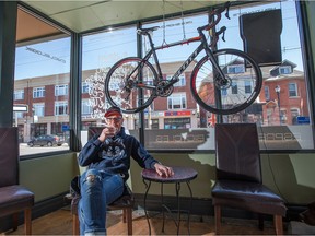 Cyclelogik owner Ian Fraser, with a cup of espresso at his Hintonburg shop, which offers Cervelo, Scott and Felt bicycles, tires, cycling clothes and indoor cycling classes, advertises that it's powered by caffeine -- step up to the bar for latte or a cappuccino.