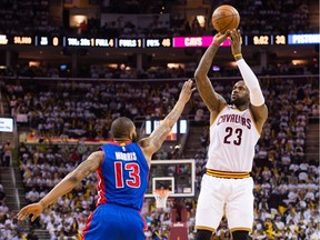 APRIL 17: LeBron James #23 of the Cleveland Cavaliers shoots over Marcus Morris #13 of the Detroit Pistons during the second quarter of the NBA Eastern Conference Quarterfinals at Quicken Loans Arena on April 17, 2016 in Cleveland, Ohio. The Cavaliers defeated the Pistons 106-101.