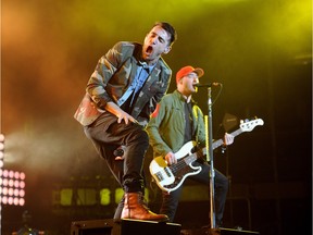 acob Hoggard (front), lead singer for the Canadian pop-rock band Hedley, with bass player Tommy Mac, who five years ago battled an undisclosed form of cancer.