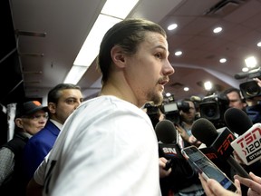 Ottawa Senators' captain Erik Karlsson speaks to reporters as the team clears out of the locker room at the end of the NHL season on Monday, April 11, 2016 in Ottawa.