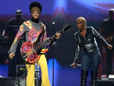 Musician Prince has reportedly Died at 57 on April 21, 2016. LAS VEGAS, NV - SEPTEMBER 22:  Recording artist Prince (L) and singer Mary J. Blige perform onstage during the 2012 iHeartRadio Music Festival at the MGM Grand Garden Arena on September 22, 2012 in Las Vegas, Nevada.
