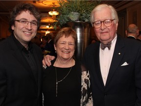 From left, Alain Trudel, new principal guest conductor of the Ottawa Symphony Orchestra, with its board president, Martha Hynna, and BLG lawyer David W. Scott, honorary chair of the Spring Symphony Soiree held at the Fairmont Chateau Laurier on Saturday, April 16, 2016. (Caroline Phillips / Ottawa Citizen)