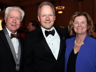 From left, Alberta Senator Doug Black with Bank of Canada Governor Stephen Poloz and his wife, Valerie, at the Politics and Pen dinner held at the Fairmont Chateau Laurier on Wednesday, April 20, 2016, in support of The Writers' Trust of Canada.