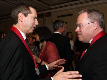 From left, former Ontario premier Dalton McGuinty in conversation with Maclean's political editor Paul Wells at the Politics and Pen dinner held at the Fairmont Chateau Laurier on Wednesday, April 20, 2016, in support of The Writers' Trust of Canada.