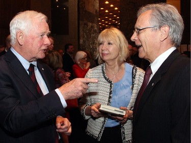 From left, Gov. Gen. David Johnston in conversation with Gilles Patry, president and CEO of the Canada Foundation for Innovation, and his wife, university professor Ruby Heap, at the launch of Johnston's new book, The Idea of Canada: Letters to a Nation, held at the National Arts Centre on Tuesday, April 19, 2016. (Caroline Phillips / Ottawa Citizen)
