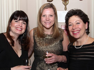 From left, Heidi Bonnell and Susan Wheeler from Rogers Communications with Politics and Pen committee member Elizabeth Roscoe, a senior vice president with Hill + Knowlton, at this year's dinner held at the Fairmont Chateau Laurier on Wednesday, April 20, 2016, in support of The Writers' Trust of Canada.