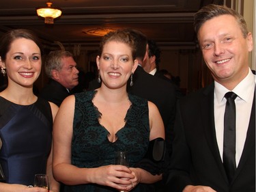 From left, Joanne Pitkin with Gillian Cartwright and Scott Jamieson at the Politics and Pen dinner held at the Fairmont Chateau Laurier on Wednesday, April 20, 2016, in support of The Writers' Trust of Canada.