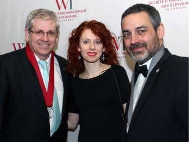 From left, NDP MP Charlie Angus with his daughter, Mariah Griffin-Angus, and NDP MP Pierre Nantel arrive to the Politics and Pen dinner held at the Fairmont Chateau Laurier on Wednesday, April 20, 2016, in support of The Writers' Trust of Canada.