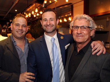 From left, Noah Firestone, owner of Luxe Bistro, with his good friend J.D. Lees and his father, Phil Firestone.