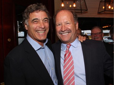 From left, prominent businessmen Stephen Greenberg, president of Osgoode Properties, and Rick Hunter, president and CEO of ProSlide Technology Inc.