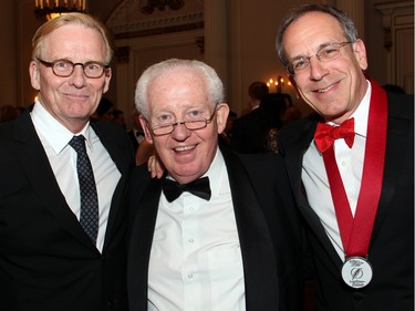 From left, veteran political journalist Robert Fife with Senator David Smith and author, professor and Citizen columnist Andrew Cohen at the Politics and Pen dinner held at the Fairmont Chateau Laurier on Wednesday, April 20, 2016, in support of The Writers' Trust of Canada.