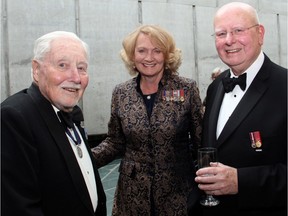 From left, World War II naval veteran and retired rear-admiral Bill Christie, 96, of Ottawa (originally from Digby, N.S.), with Karen McCrimmon, parliamentary secretary to the Minister of Veterans Affairs and associate minister of national defence, and Jim Carruthers, president of the Naval Association of Canada, at its annual Battle of the Atlantic Gala Dinner, held at the Canadian War Museum on Thursday, April 28, 2016.