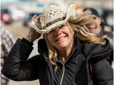 Garth Brooks fans make their way in the bitter cold wind outside of the Canadian Tire Centre on Sunday April 3, 2016.