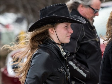 Garth Brooks fans make their way in the bitter cold wind outside of the Canadian Tire Centre on Sunday April 3, 2016.