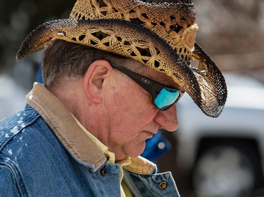 Garth Brooks fans make their way in the bitter cold wind outside of the Canadian Tire Centre on Sunday April 3, 2016.