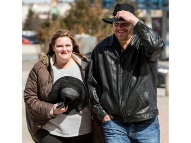 Garth Brooks fans make their way in the bitter cold wind outside of the Canadian Tire Centre on Sunday April 3, 2016.