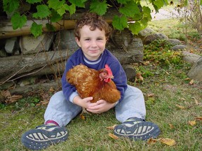 Jacob Maxwell has loved chickens ever since he first saw them when he was two years old here- shown in 2002.