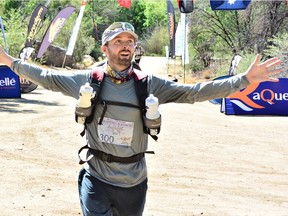 Jim Willett completing the seven-day, 242 km ultramarathon across the Kalahari Desert in 2013.