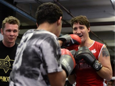 Prime Minister Justin Trudeau spars with Justin, 15.