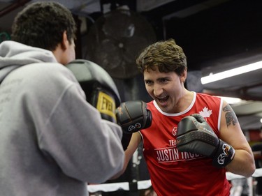 Prime Minister Justin Trudeau spars with Keone, 18.