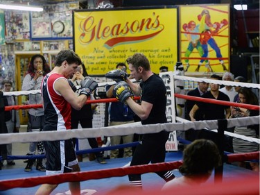 Prime Minister Justin Trudeau spars with professional boxer Yuri Foreman.