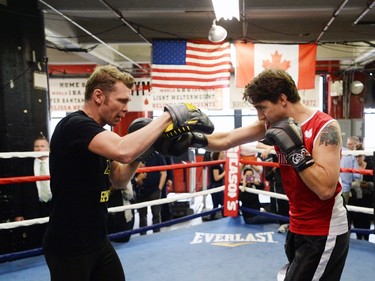 Prime Minister Justin Trudeau spars with professional boxer Yuri Foreman.